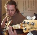 Me with one of my babies - my mid-90s MusicMan Stingray Bass Guitar